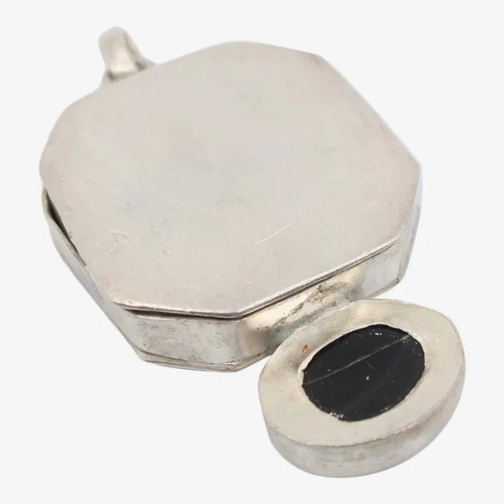 Unisex Silver Color Astha Dhatu Pendant with Sani Yantra – Protection, Stability & Positive Energy